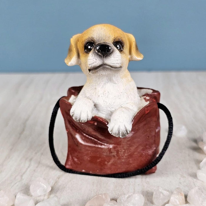 1 pc Cute Miniature Dog in Bag Poly Resin Statue with Hanging, Decorative Piece for Living Room, Bed Room, Table top, Restaurant, cafes, Gifting, Birthday( Pack of 1)