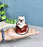 1 pc Cute Miniature Dog in Bag Poly Resin Statue with Hanging, Decorative Piece for Living Room, Bed Room, Table top, Restaurant, cafes, Gifting, Birthday( Pack of 1)