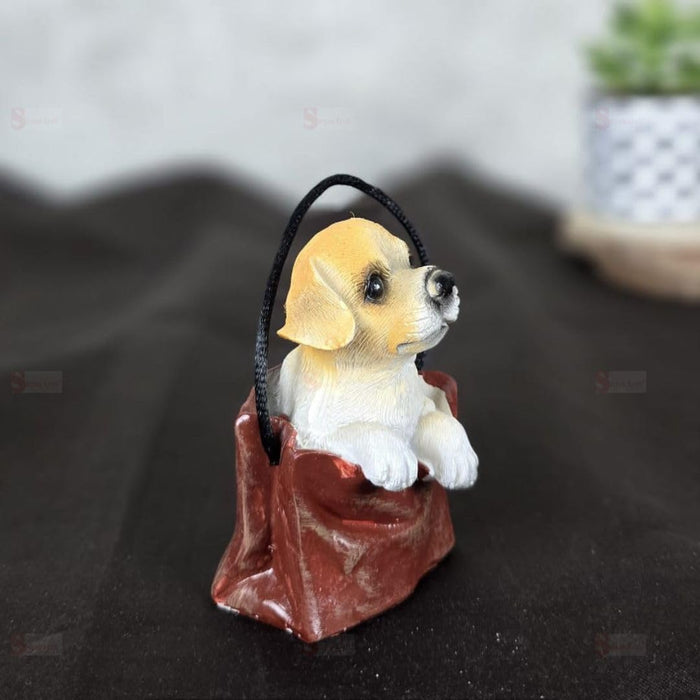 1 pc Cute Miniature Dog in Bag Poly Resin Statue with Hanging, Decorative Piece for Living Room, Bed Room, Table top, Restaurant, cafes, Gifting, Birthday( Pack of 1)