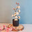 1 Pc Artificial Blossom Flower Stick with Plastic Pot Flower Pot for Home Decor, Living Room, Gifting, Table Top, Showpiece, Balcony, Raksha Bandhan Gifting(Pack of 1)(with Pot)